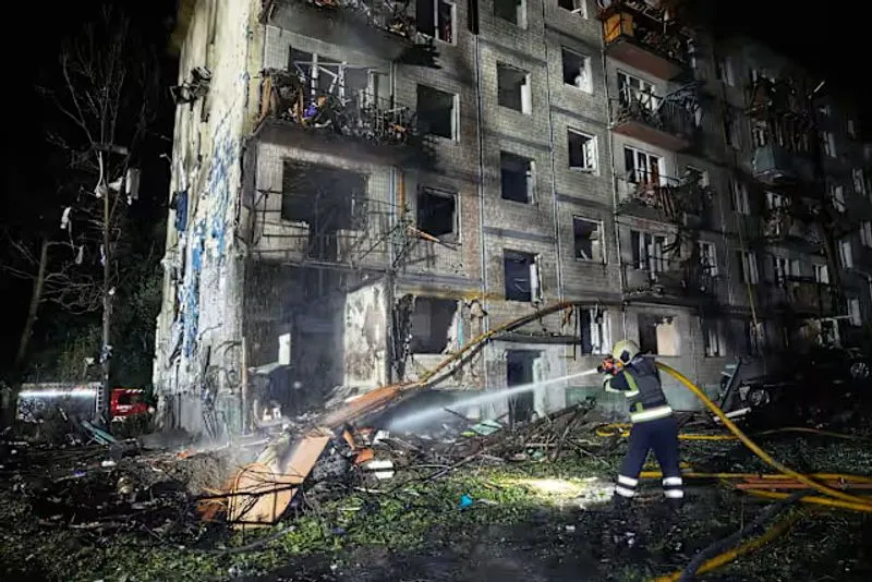 Russia hits Ukrainian capital with ballistic  missiles and drones, killing at least 9