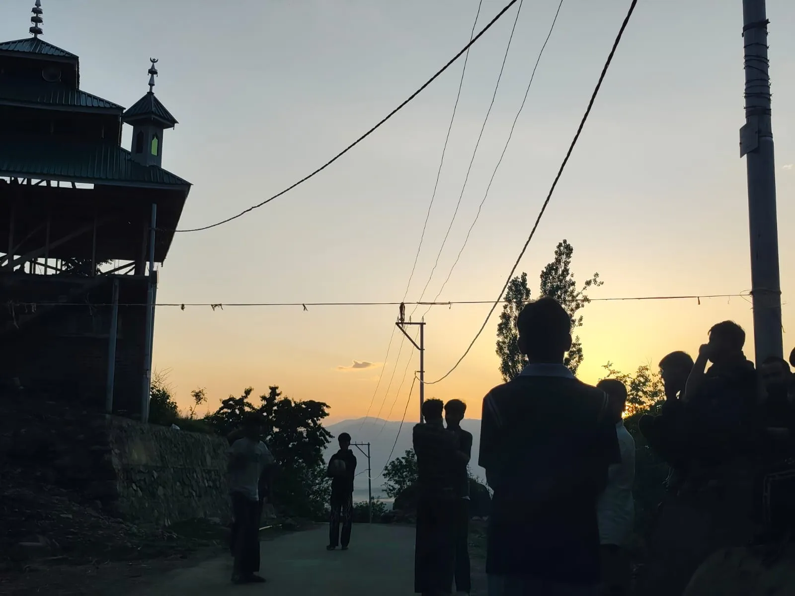 THE NET IS A LIE:In Bandipora’s Chanpal, a frayed rope divides a road into a volleyball court