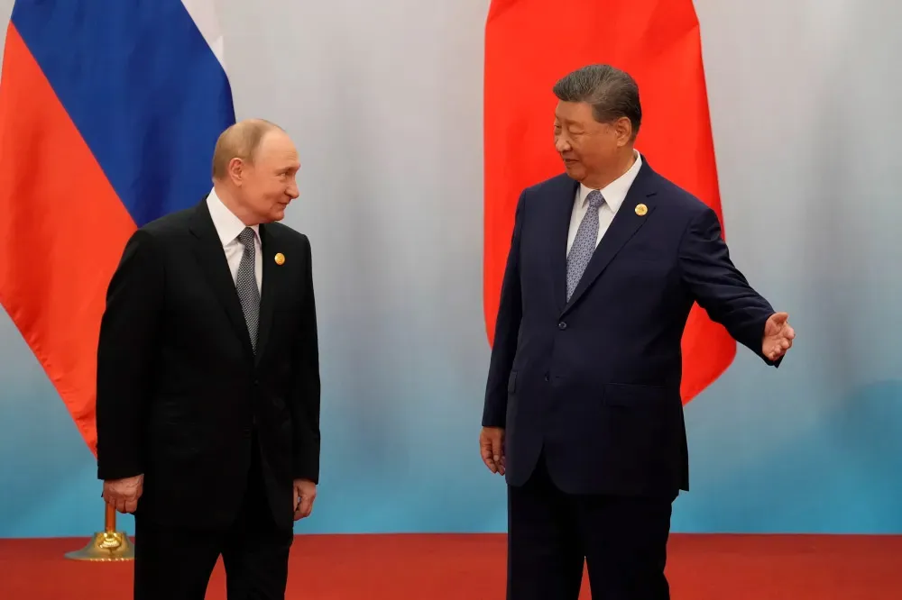 Putin visits China to reaffirm Russia ties as Xi  also seeks stable US relations after Trump summit